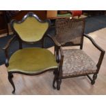 An early 20th Century cane back oak armchair and reproduction early 20th Century Continental parlour