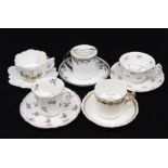 A collection of five mainly early 20th Century china moustache cup and saucers to include: Late