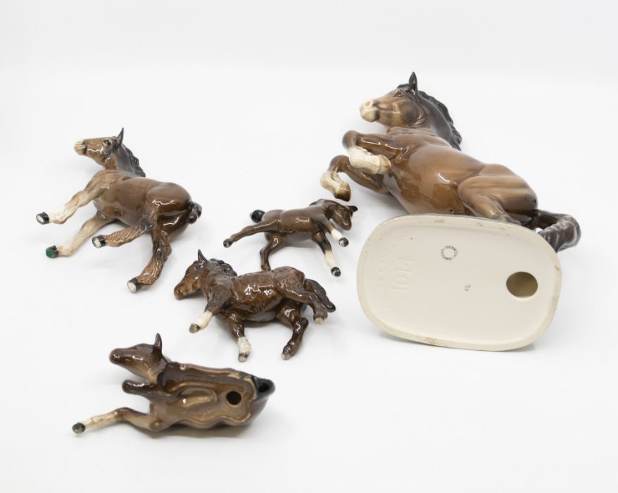 A rearing Beswick horse, together with four foals including a shire foal and shetland foal - Image 3 of 3