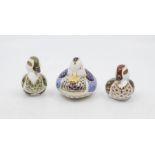 A collection of Royal Crown Derby paperweights including three ducks