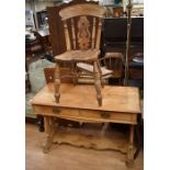 A hall table in pine, early 20th Century with 2 drawers and a pine kitchen chair