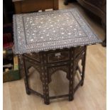 An Anglo Indian 2 part collapsible table with inlaid bone detail
