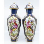 A pair of six sided export vases and covers decorated with birds and insects on white ground with