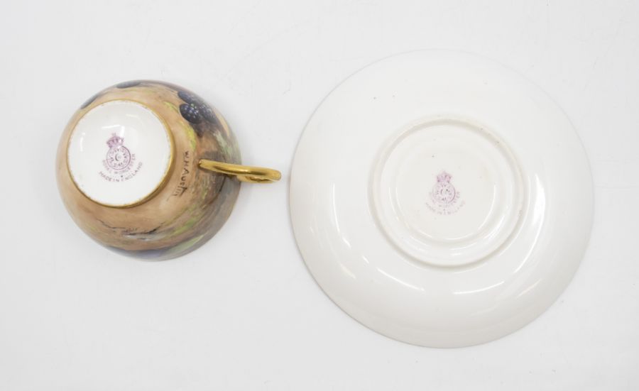 A Royal Worcester fruit pattern cup and saucer with gilt interior, signed by WH Austin on cup and W. - Image 2 of 3