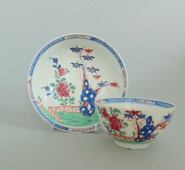A Lowestoft Polychrome Tea bowl & Saucer Bamboo Rock Peony & Fence pattern. Circa: 1780-85 Size of