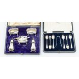 A silver hallmarked boxed cruetset and a boxed set of sugar tongs and 6 teaspoons