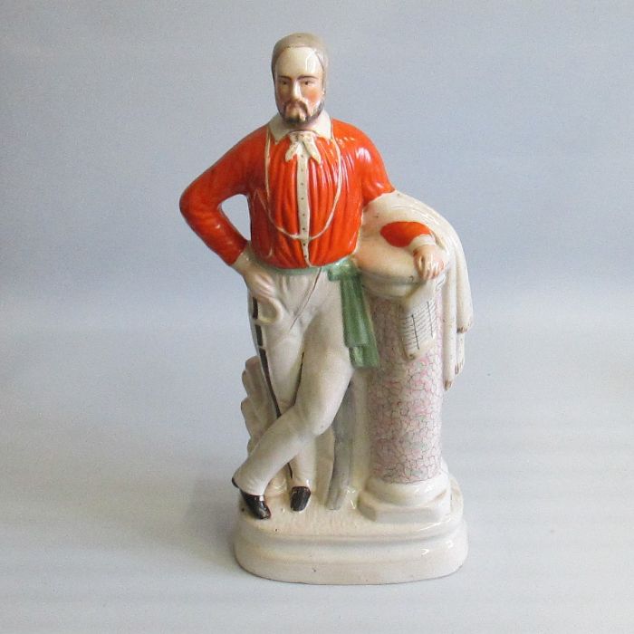 A Large Staffordshire figure of Garibaldi leaning on a post. Circa 1860 Size: height 49 cm, width 25