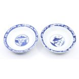 Two 20th Century Chinese blue and white bowls, each one 18cm diameter, with wax seal remains to base