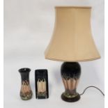 Moorcroft: A group of three Moorcroft 'Cluny' pattern items to include table lamp on wooden stand