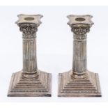 A pair of Victorian Walker & Hall silver column candlesticks, Sheffield 1893, loaded bases, approx