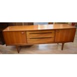 Retro late1960s/early 1970s teak sideboard with three central drawers flanked on either side by