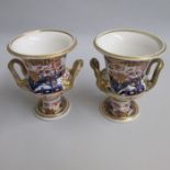 Two Spode twin handled Campania Vases, Imari pattern 976 (2) Circa: 1805-1810   SPODE in red 976