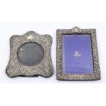 A late Victorian silver mounted easel photograph frame, Chester 1900, 18cm x 13cm; and another,