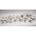 A quantity of Royal Crown Derby posies pattern to include 12 trios, 3 trinket boxes, a milk jug, two