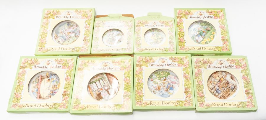 A collection of Royal Doulton Bramley Hedge collectors plates, most of which are boxed