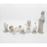 Six Lladro figures of geese, children and young lady, along with Nao table lamp
