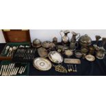 A large collection of various silver plated items to include white metal cutlery