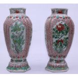A pair of Chinese porcelain Kangxi period vases Height, Faults to top , chips to both