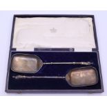 A cased set of large apostle spoons