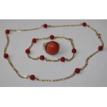 A coral station necklace and bracelet with Russian stamps for 14k gold (gross 8.7g), plus a coral