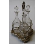 K and W, a William IV silver spirit decanter stand with florally cast ring handle and reeded