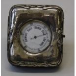 A pocket barometer within an Art Nouveau silver and leather easel case, D5cm