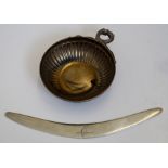 A sterling silver boomerang W18cm and a silver dish with fluted decoration W11cm