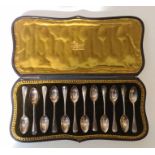 A cased set of twelve Hanoverian pattern teaspoons, London 1906