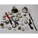A quantity of watches and watch repair parts