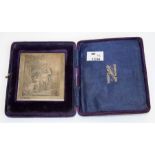 A cased engraved silver panel depicting Kaiser Wilhelm in dress uniform beside a horse 8 x 2cm,