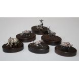 Patrick Mavros (Zimbabwe), a set of six cast silver African animal name card holders, each with PM