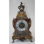 A Louis XV style Boulle mantle clock, the gilt metal applied waisted balloon case enclosing an eight