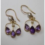 Pair of Amethyst earrings, with seedpearl accents, metal unmarked but tests as 9ct gold. Gross