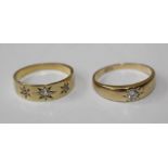 A pair of dress rings, gypsy set with diamond, one single stone, size K, stamped 18ct and tests