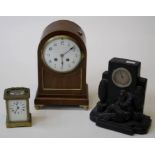 An Edwardian mahogany cased mantle clock, the gong striking movement named Samuel Marti, faced by