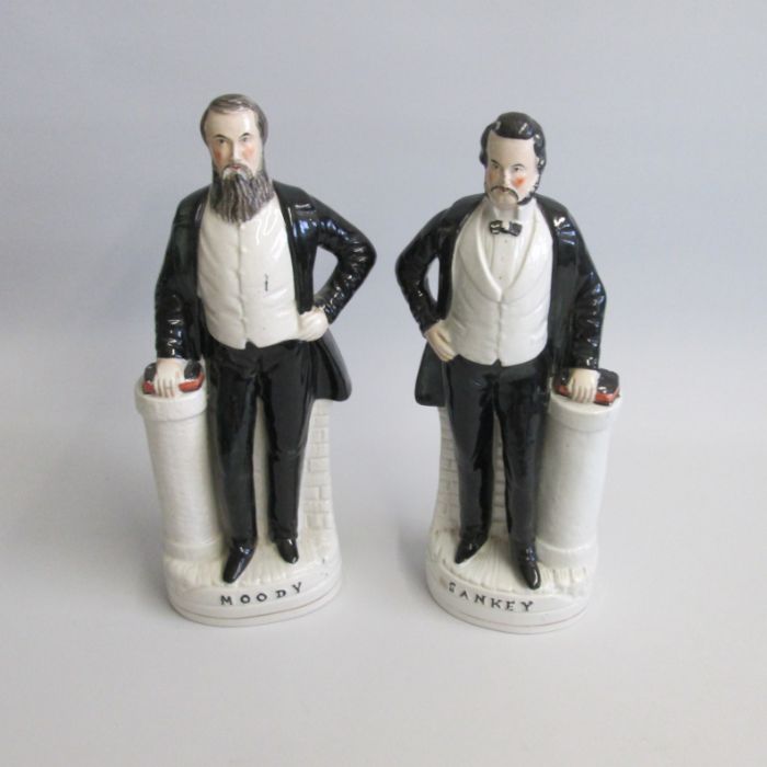 A Rare pair of Staffordshire Portrait figures of Moody and Sankey. Moody, titled in black