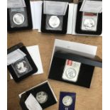 Collection of cased silver coins and Two CN Proof £5 Coins. includes Australian Kangaroo, two