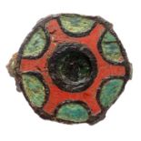 Roman enamelled disc brooch, 2nd century AD. A bronze disc brooch, the front face having champleve