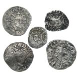 Group of five medieval hammered silver coins including Henry IV halfpenny, pennies of Henry III