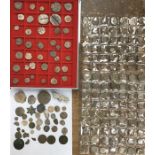 Large collection of lead tokens and seals.