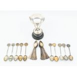 A collection of early 20th Century Wednesday Golf Club silver teaspoons and other similar spoons,