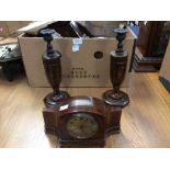 A 1930's walnut mantle clock, Eltington of Liverpool, along with two mantle candlesticks, in oak