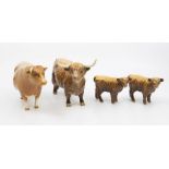 A collection of ceramics including Beswick examples; group of cattle which includes two Highland