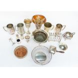 A collection of silver plated items to include; toast rack, bowls, vases, tankards, wine coasters,