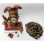 Two clocks for restoration/spares. 1. A French spelter mantel clock (damaged) with a lion and