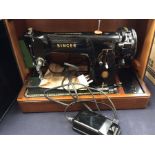 A cased electric Singer sewing machine, late 20th Century