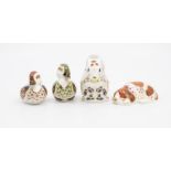 Four Royal Crown Derby paperweights including a puppy, duckling, green duckling and a squirrel,