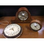 A 1930's inlaid mantle clock, a 1950's mantle clock, and a 1980's wall clock