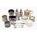 A collection of 20th Century silver condiments to include three salts, mustard pot and cover, two