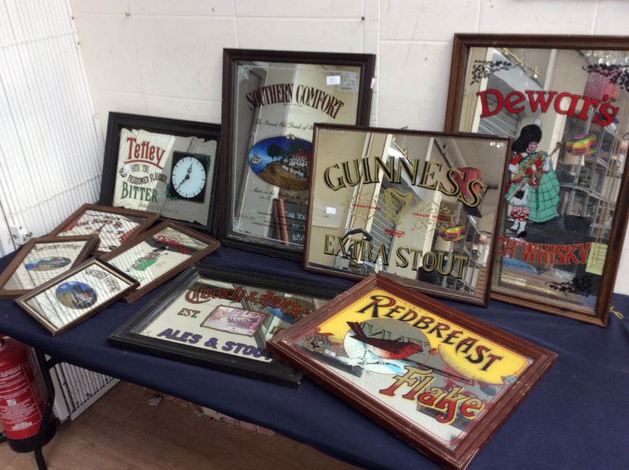 A collection of pub advertising wall mirrors, medium and small sizes, mid 20th Century ales and